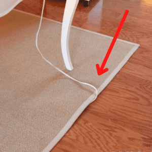Hide cables under the rug